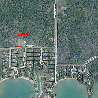 An aerial map with Scott's Point Park outlined in red.